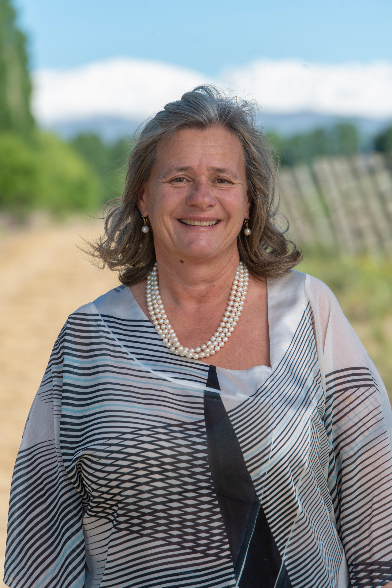 Expert winemaker in vineyard